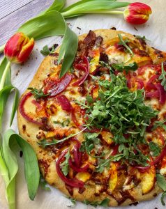 PEACHY STEAK AND BACON PIZZA WITH HERBY CHEESE AND BANANA PEPPER SAUCE