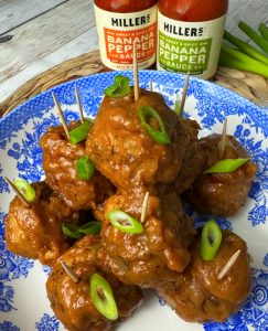 SWEET AND SPICY TURKEY MEATBALLS WITH BANANA PEPPER PEANUT SAUCE