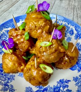 SWEET AND SPICY TURKEY MEATBALLS WITH BANANA PEPPER PEANUT SAUCE