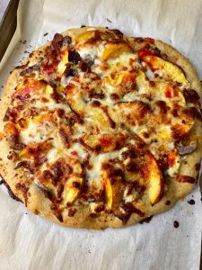 PEACHY STEAK AND BACON PIZZA WITH HERBY CHEESE AND BANANA PEPPER SAUCE